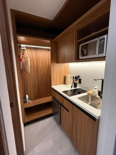 Een keuken of kitchenette bij Pánuco Suites