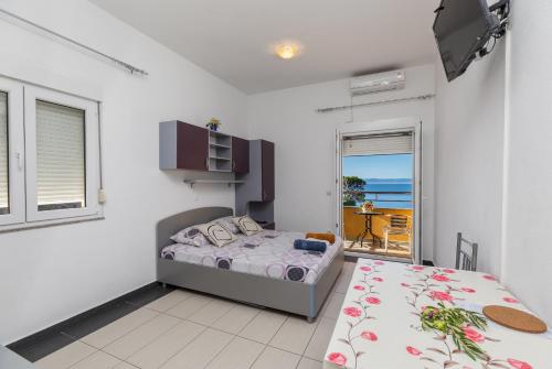 Apartments with parking space Krvavica, Makarska - 23540
