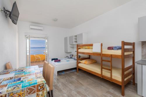 Apartments with parking space Krvavica, Makarska - 23540