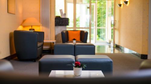 Khu vực ghế ngồi tại Fontana Hotel Wiesbaden