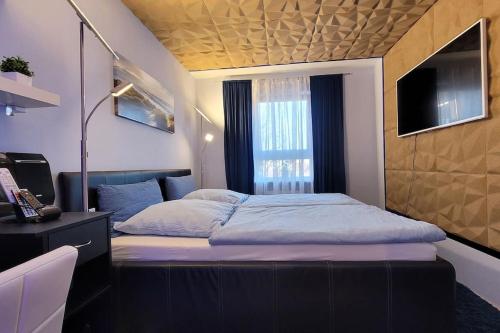 Katil atau katil-katil dalam bilik di Unique Munich Apartment
