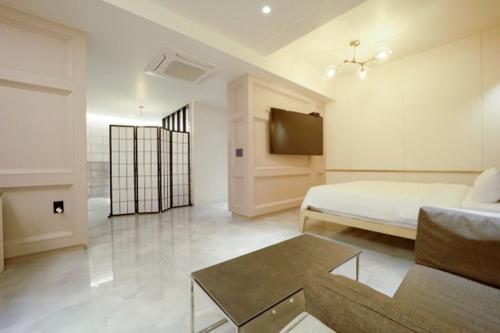 TV a/nebo společenská místnost v ubytování Ulsan Jinjang-dong Samsung Jang Hotel