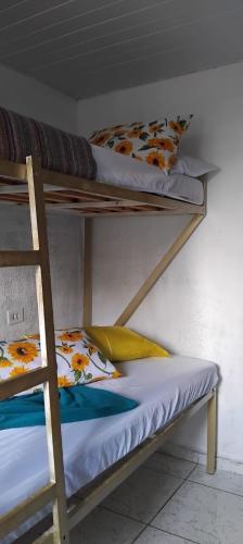 a couple of bunk beds in a room at Hostel Aprisco São Paulo in São Paulo