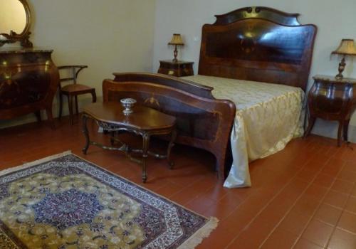 
Letto o letti in una camera di Al Palazzo Antico
