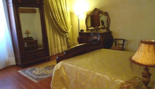 
Letto o letti in una camera di Al Palazzo Antico
