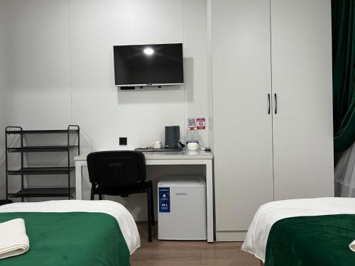 Ein Bett oder Betten in einem Zimmer der Unterkunft 51 guest house