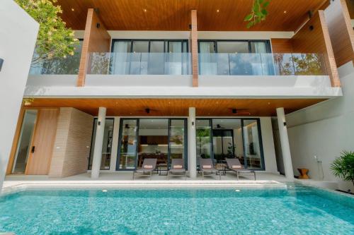 Bazén v ubytování Modern Tropical Pool Villa - Saiyuan nebo v jeho okolí