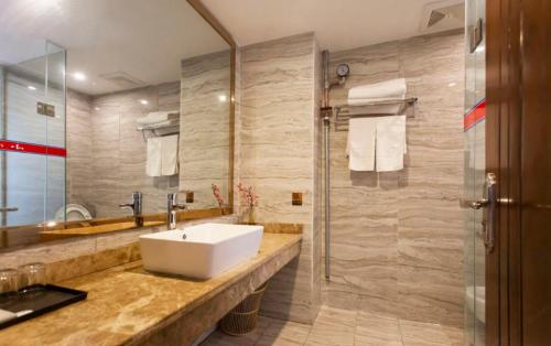 Koupelna v ubytování Zhangjiajie Huan Sha Ju Hotel