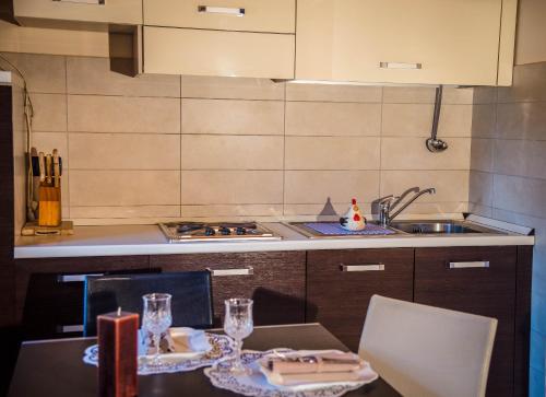 A kitchen or kitchenette at Hotel San Paolo