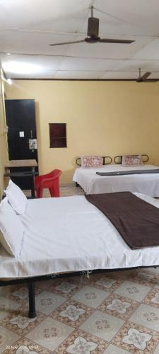 Ένα ή περισσότερα κρεβάτια σε δωμάτιο στο Aguiar Guest House