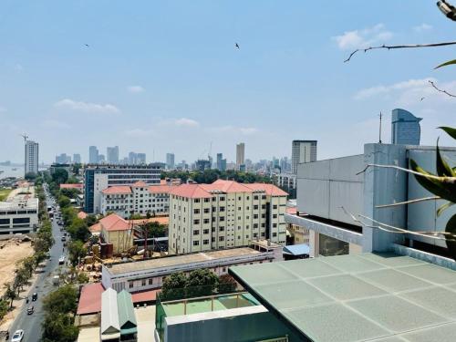 a view of a city with buildings and a street at LCS Hotel & Apartment in Phnom Penh