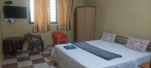 TV a/nebo společenská místnost v ubytování Aguiar guest House