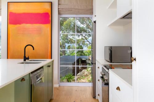 Η κουζίνα ή μικρή κουζίνα στο Bay Haven Collection, Hout Bay