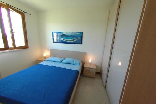 Tempat tidur dalam kamar di Residence Cernaia