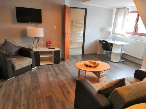 Χώρος καθιστικού στο Hotel Zur Schmiede