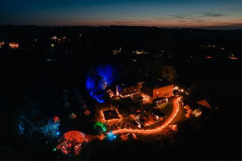 an aerial view of a building at night at Daft Hotel in Malmedy