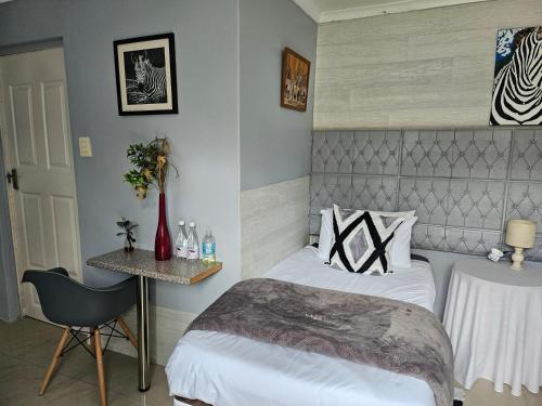 Katil atau katil-katil dalam bilik di Zufike Self Catering