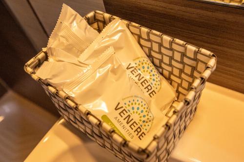 a basket with a bag of milk in it at SANBARTO LA CASA DEL BORGO in Cassano Irpino