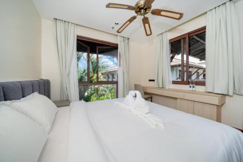 Katil atau katil-katil dalam bilik di Elite Harbor Living - Royal Marina Penthouse RPM 6B with Panoramic Rooftop Terrace