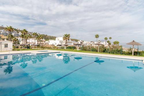 Bazén v ubytování Playa Paraíso 86 - Family Holiday in a Townhouse at the Beach nebo v jeho okolí