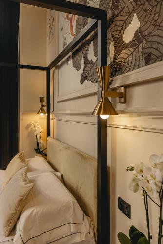 Katil atau katil-katil dalam bilik di Roma Luxus Hotel