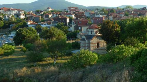 a small town with houses and trees in a city at Family Hotel Mimosa in Tsarevo
