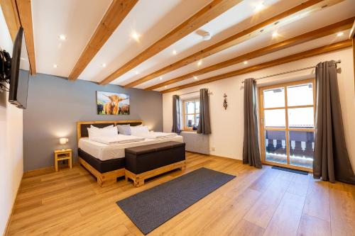 Postel nebo postele na pokoji v ubytování Alpenherz