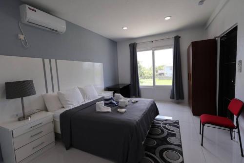 Llit o llits en una habitació de Rodney Bay