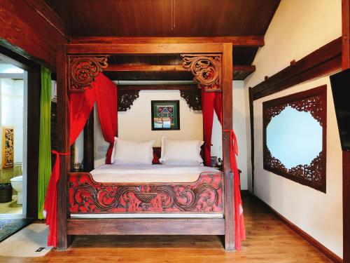 Big Tree Guesthouse - Naxi old styleにあるベッド