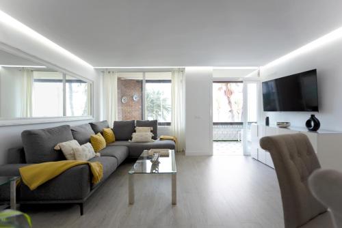 TV a/nebo společenská místnost v ubytování Ocean View Malagueta