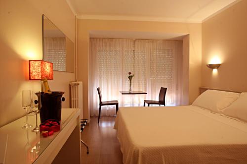 En eller flere senge i et værelse på Hotel Sol-Park