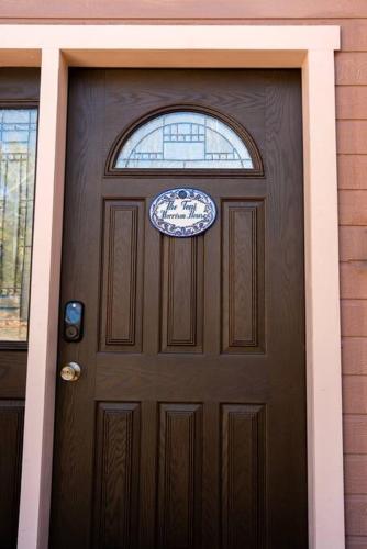 a wooden door with a window on a house at Artsy Half-House, Walk to Hiking Trails &Wine Bars! Yard, Firepit in Sedona