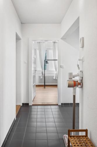 Кровать или кровати в номере Comfortable stay in Oerlikon 20 minutes away from Zurich Airport