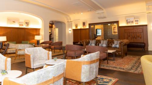 a restaurant with tables and chairs in a room at Harbor Court Hotel in San Francisco