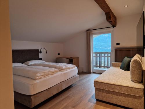 Postel nebo postele na pokoji v ubytování Pomella's Guesthouse