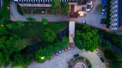 an overhead view of a parking lot with cars at Park Hotel Kaylaka in Pleven