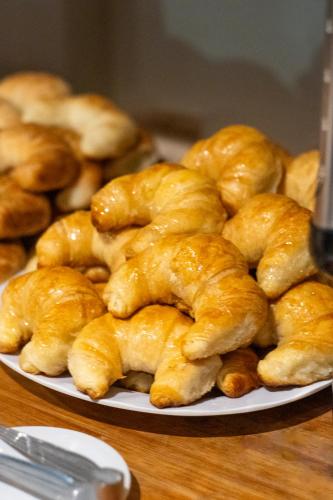 a plate of pastries sitting on top of a table at HOTEL CITY in Posadas