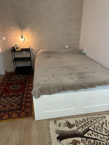 Katil atau katil-katil dalam bilik di Cozy place in Malaga