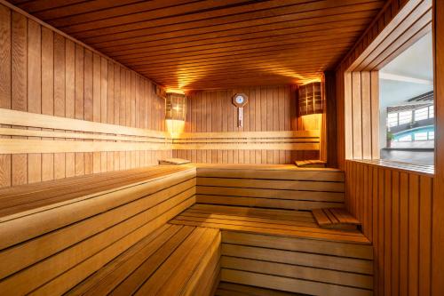 an empty wooden sauna with a window in it at AHC Old City Hotel in Istanbul