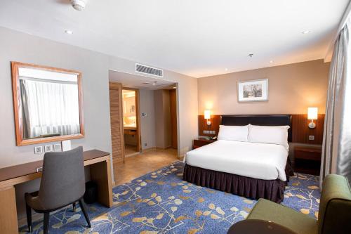 Postel nebo postele na pokoji v ubytování Holiday Inn Macau by IHG