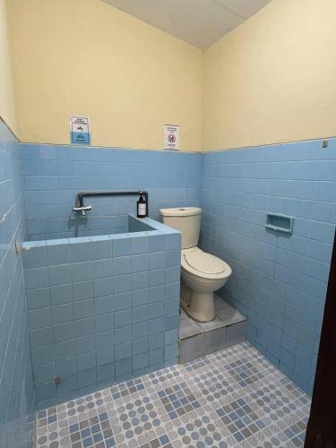 Ванная комната в Dehome Pakuwon Mall 2 Syariah