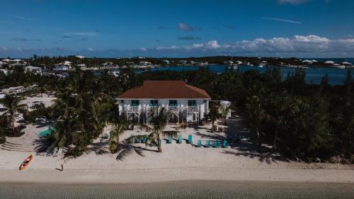 an aerial view of a house on the beach at Guana Beach Inn in Great Guana Cay