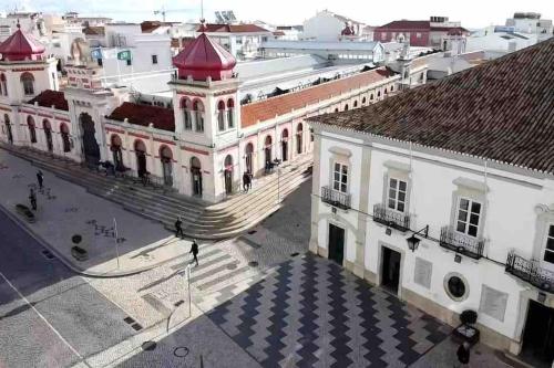 an aerial view of a building in a city at Castle House Loulé City Center in Loulé