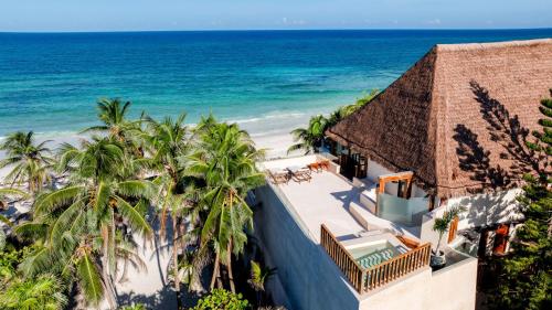 an aerial view of a resort with the beach at Secrets Tulum Resort & Beach Club - Adults Only - All Inclusive in Tulum