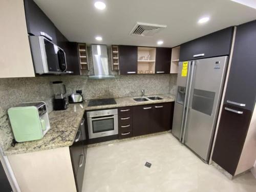 Η κουζίνα ή μικρή κουζίνα στο Apartamento Vacacional - Vista al Mar - Petalo 1 Piso 1
