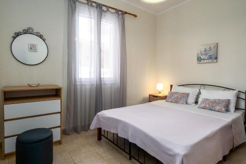 Postel nebo postele na pokoji v ubytování Adonino Apartment