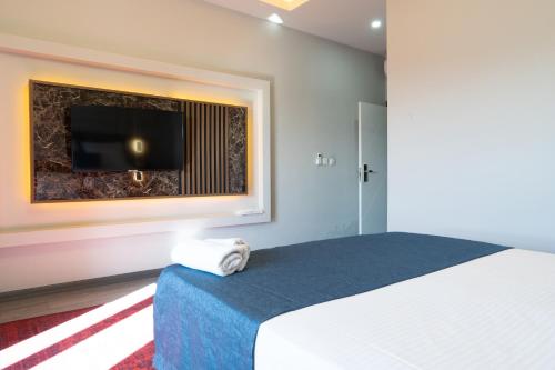 GRAND MOON HOTELにあるベッド