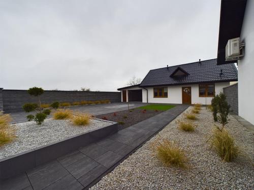 ApartamentySnu, Dom na Przedmieściu