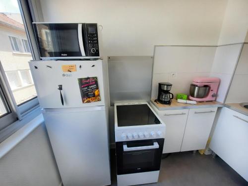 Courtépée - Apt 4 Prs avec balcon en centre ville