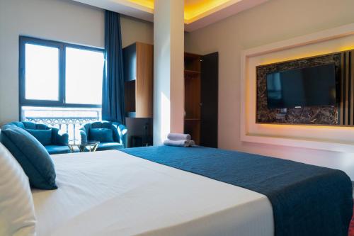 GRAND MOON HOTELにあるベッド